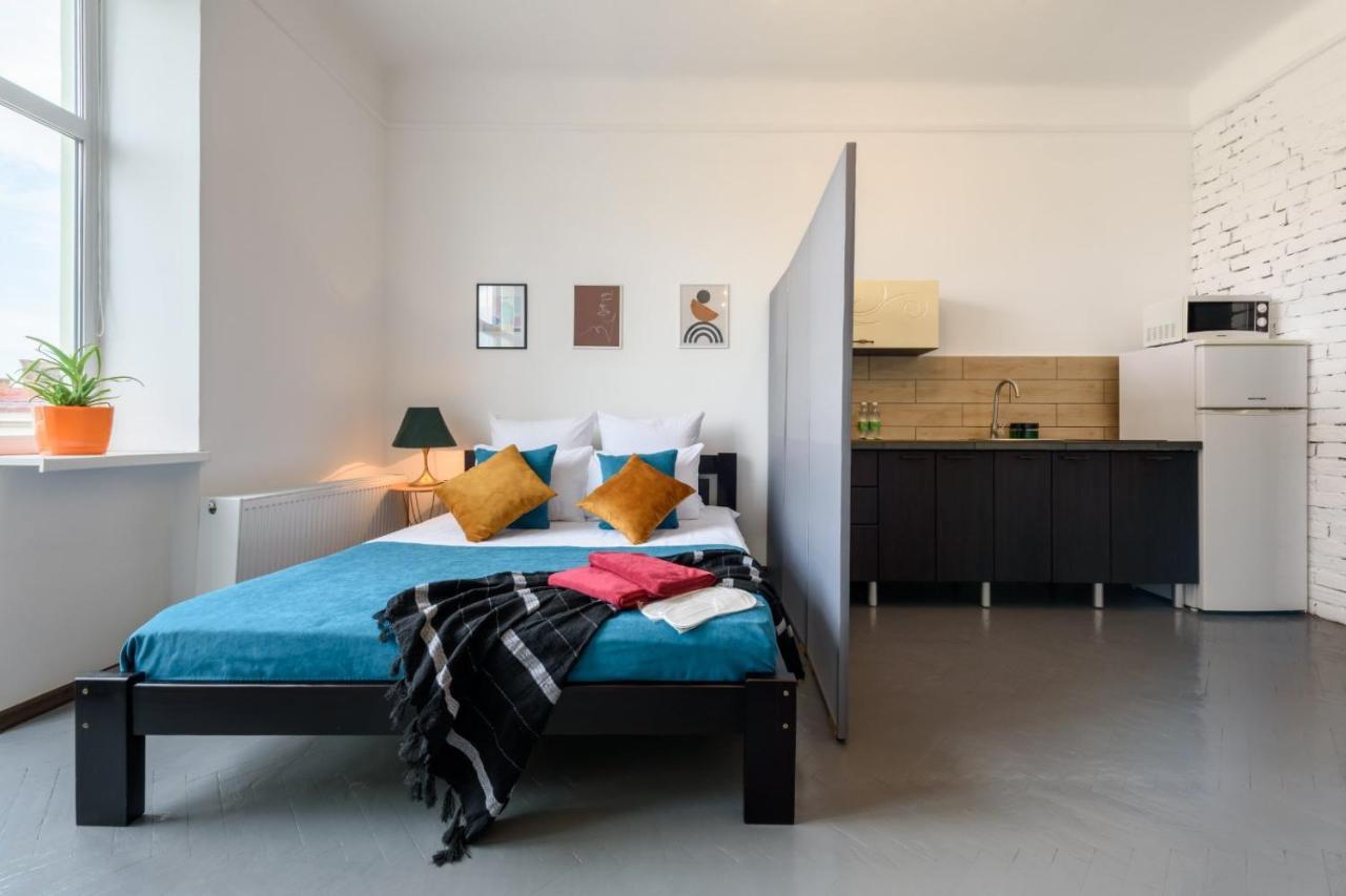 Apartment затишна студія в стилі лофт в самому центрі міста *